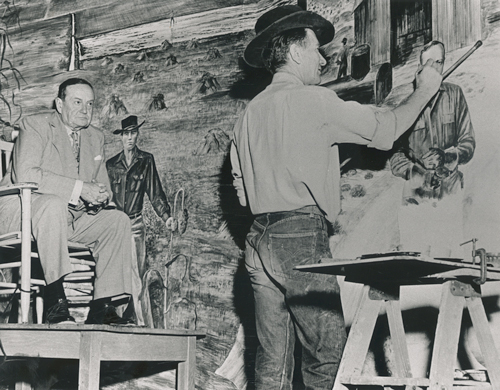 Photo of Sid Richardson sitting for a portrait with Peter Hurd.